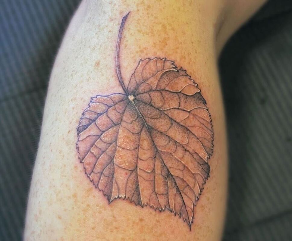 Painted negative of an aspen leaf by Tanin at Birch Avenue Tattoo in  Flagstaff, AZ : r/tattoos